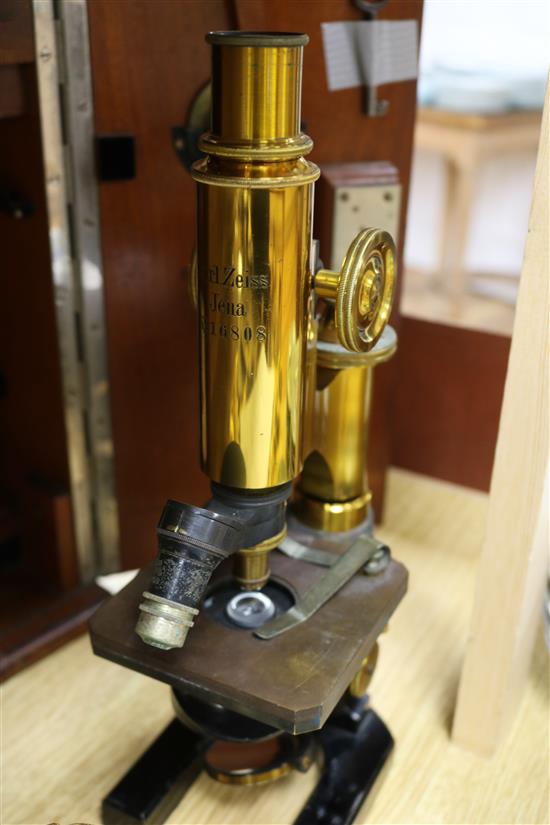 A Carl Zeiss Jena lacquered brass and black enamelled microscope, No. 16808, 37cm high